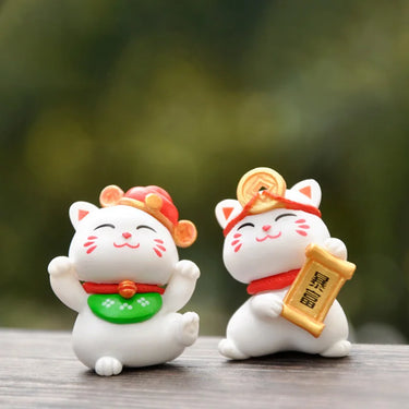 The Luxury Golden Fortune Cat Collection by KittyNook Cat Co. features two smiling cats holding golden objects for prosperity decor.